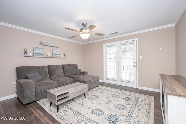 2421 Beachview Dr Unit H2, Ocean Springs, MS 39564 - living area featuring dark wood-style flooring, crown molding, baseboards, and a ceiling fan