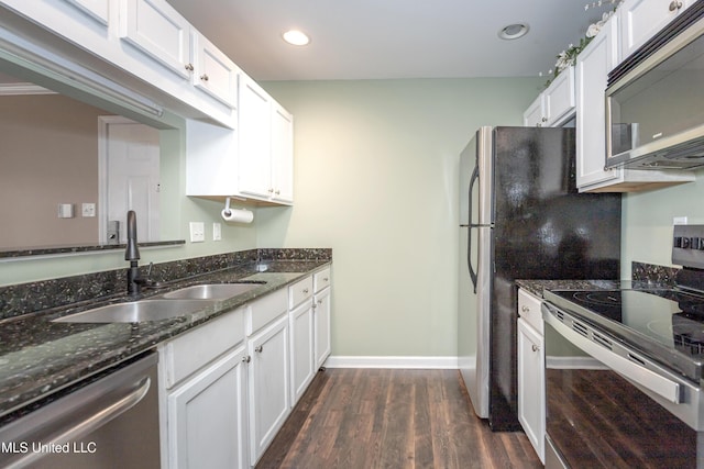2421 Beachview Dr Unit H2, Ocean Springs, MS 39564 - kitchen featuring appliances with stainless steel finishes, a sink, white cabinetry, and recessed lighting