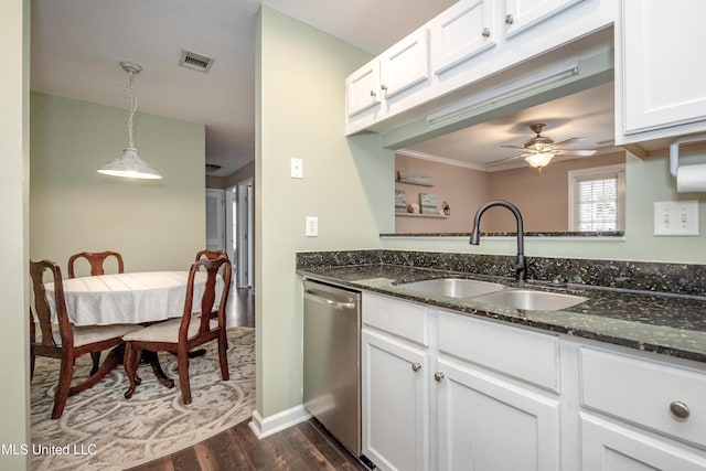 2421 Beachview Dr Unit H2, Ocean Springs, MS 39564 - kitchen with a sink, dishwasher, dark wood-type flooring, dark stone countertops, and ornamental molding