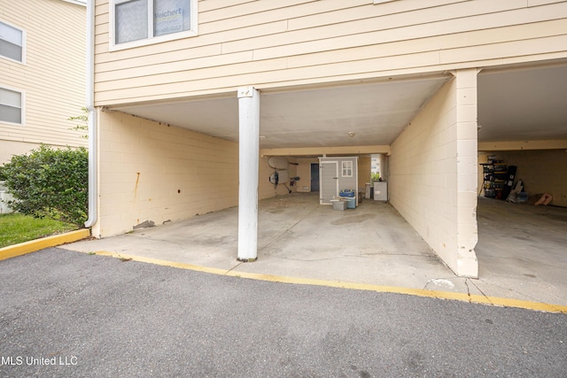 2421 Beachview Dr Unit H2, Ocean Springs, MS 39564 - view of parking featuring a carport