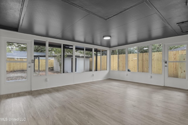 view of unfurnished sunroom