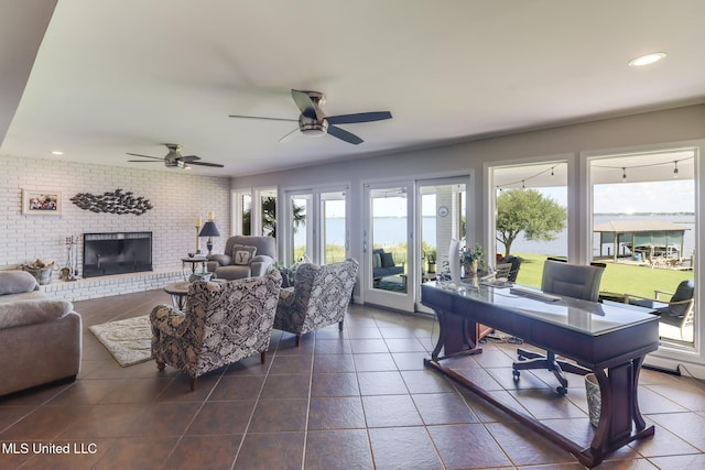 435 Christi Ln, Biloxi, MS 39531 - living area featuring an office area, dark tile patterned floors, a fireplace, recessed lighting, and ceiling fan