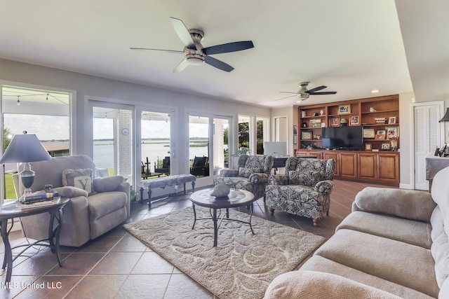 435 Christi Ln, Biloxi, MS 39531 - living area with a ceiling fan, recessed lighting, and dark tile patterned flooring