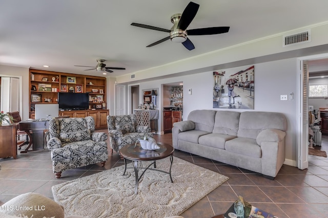 435 Christi Ln, Biloxi, MS 39531 - living area featuring tile patterned floors and ceiling fan