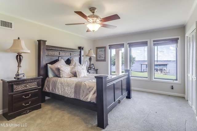 435 Christi Ln, Biloxi, MS 39531 - bedroom with carpet flooring, ceiling fan, and a closet