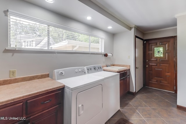 435 Christi Ln, Biloxi, MS 39531 - washroom with washing machine and dryer, recessed lighting, dark tile patterned flooring, and cabinet space