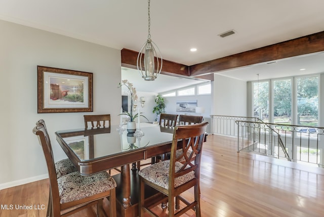 435 Christi Ln, Biloxi, MS 39531 - dining space with wood finished floors, beam ceiling, and recessed lighting