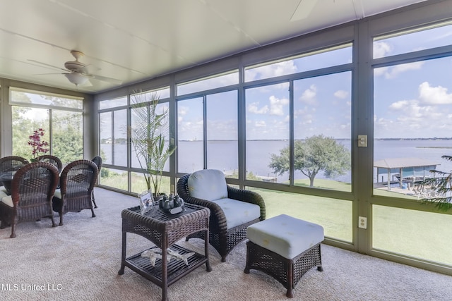 435 Christi Ln, Biloxi, MS 39531 - sunroom with ceiling fan, a water view, carpet flooring, and expansive windows
