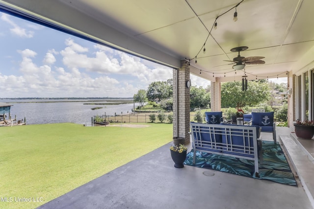 435 Christi Ln, Biloxi, MS 39531 - view of patio / terrace featuring a water view, an outdoor hangout area, and a ceiling fan