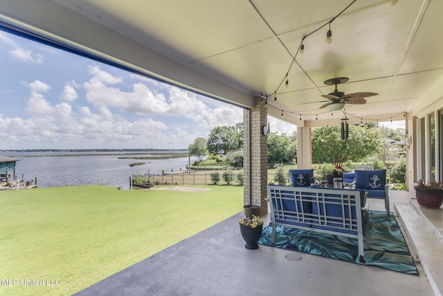 435 Christi Ln, Biloxi, MS 39531 - view of patio featuring a water view, ceiling fan, and an outdoor living space