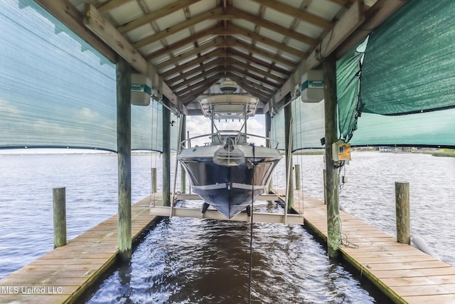435 Christi Ln, Biloxi, MS 39531 - dock featuring boat lift and a water view