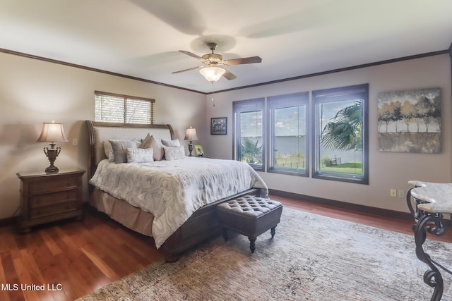 435 Christi Ln, Biloxi, MS 39531 - bedroom with crown molding, dark wood-style floors, and ceiling fan