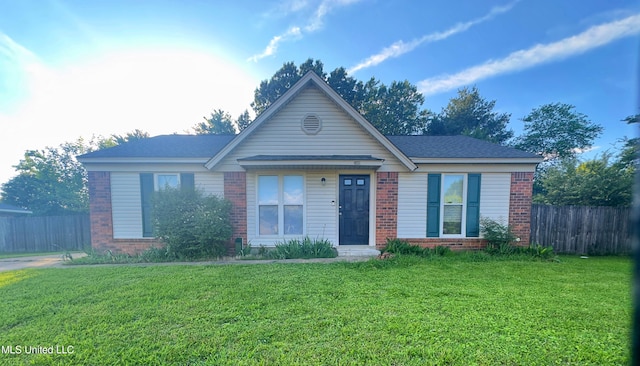 view of front of house with brick siding
