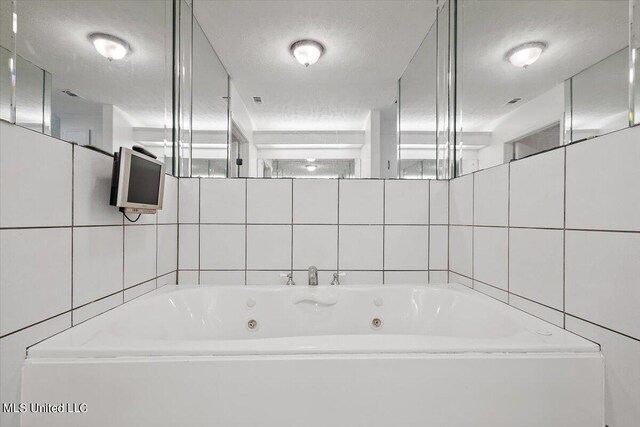 bathroom with a bathing tub