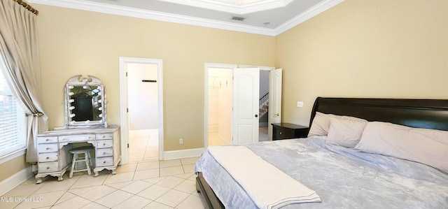 682 Hilo Way, Diamondhead, MS 39525 - bedroom with ornamental molding, light tile patterned floors, and connected bathroom