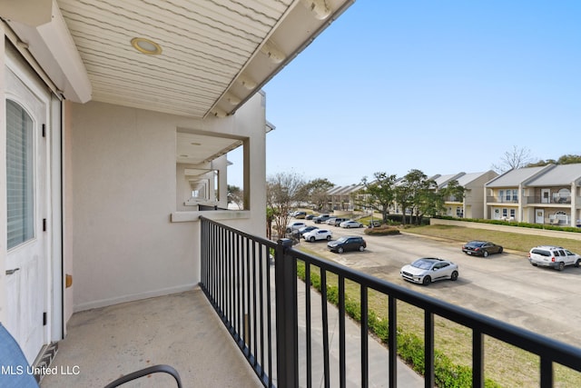 balcony featuring a residential view