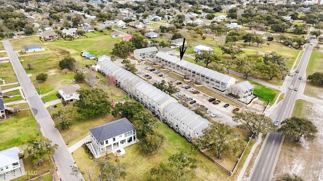 birds eye view of property with a residential view