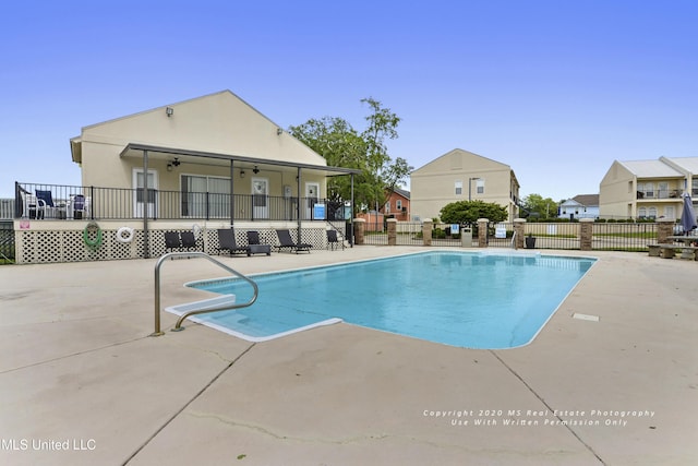 view of pool featuring a fenced in pool, a patio area, and fence