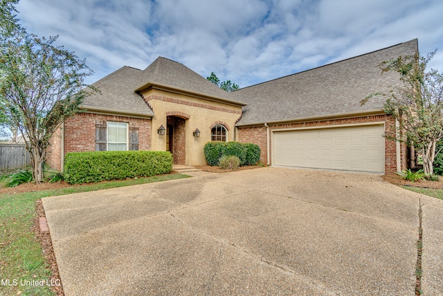 view of front of house with a garage