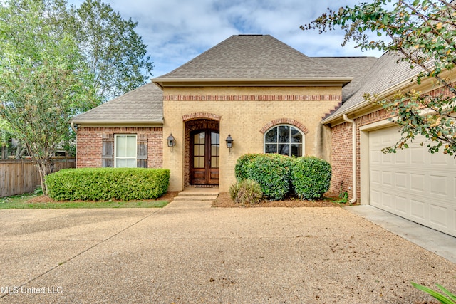 view of front of home with a garage