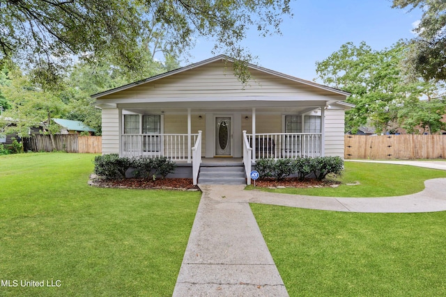 bungalow-style home featuring a front yard and a porch