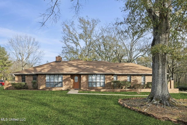 ranch-style house with a front yard