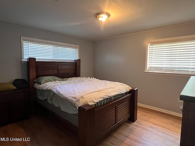206 Shields Ave, Pelahatchie, MS 39145 - bedroom with light wood-type flooring and baseboards