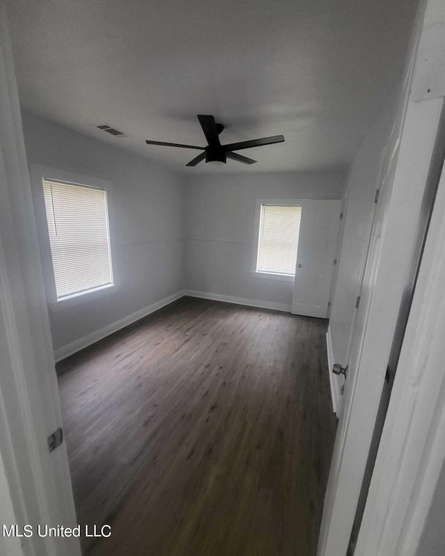 4222 Chennault Ave, Jackson, MS 39209 - spare room with baseboards, dark wood finished floors, and ceiling fan