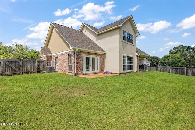136 S Cypress Lake Blvd, Madison, MS 39110 - rear view of house featuring french doors, stucco siding, a fenced backyard, and a shingled roof