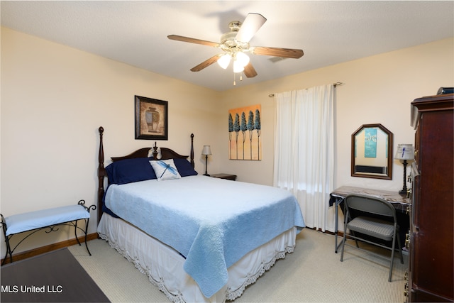 bedroom featuring carpet and ceiling fan