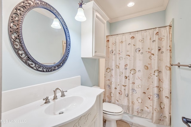 bathroom with tile patterned flooring, vanity, toilet, and crown molding