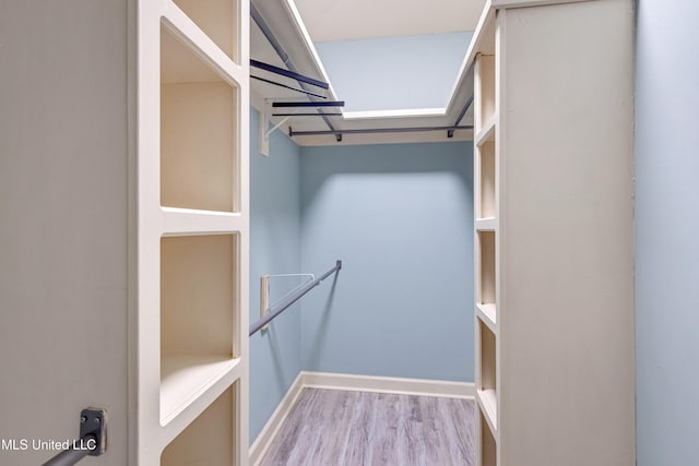 136 Sea Oaks Blvd, Long Beach, MS 39560 - spacious closet featuring wood finished floors