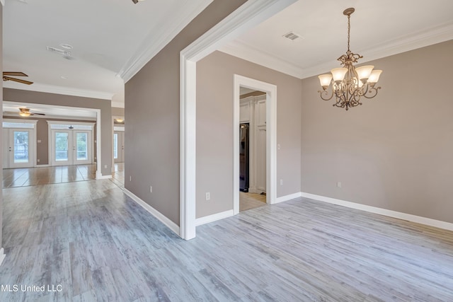 136 Sea Oaks Blvd, Long Beach, MS 39560 - spare room featuring french doors, light wood-type flooring, ornamental molding, ceiling fan, and a chandelier