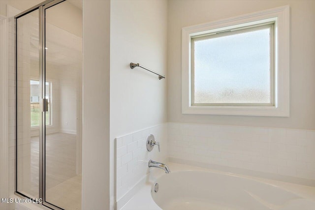 421 Baleigh Way, Canton, MS 39046 - full bath with healthy amount of natural light, a stall shower, and a bath