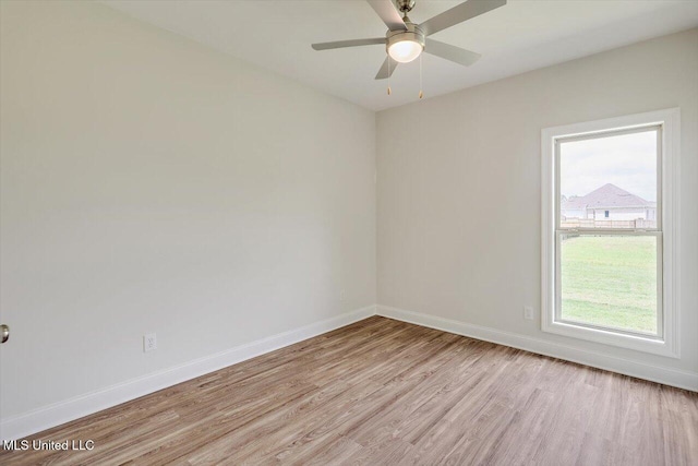 421 Baleigh Way, Canton, MS 39046 - spare room featuring light wood-type flooring, baseboards, and a ceiling fan