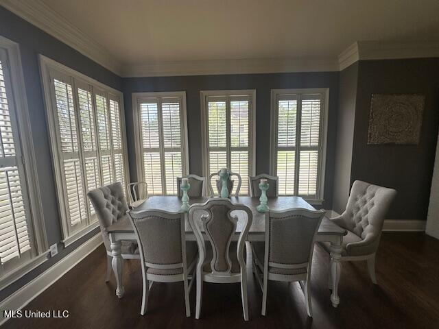 113 Hastings Ave, Brandon, MS 39042 - dining room featuring baseboards, dark wood-style floors, and ornamental molding