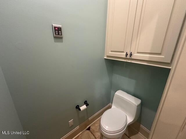 113 Hastings Ave, Brandon, MS 39042 - bathroom featuring baseboards and toilet