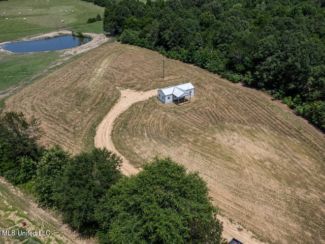 aerial view featuring a water view and a rural view