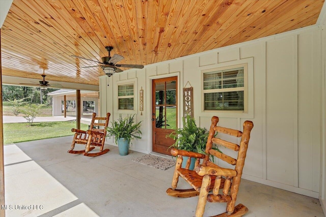 3341 Simpson Highway 13, Mendenhall, MS 39114 - view of exterior entry featuring a porch, a ceiling fan, and board and batten siding