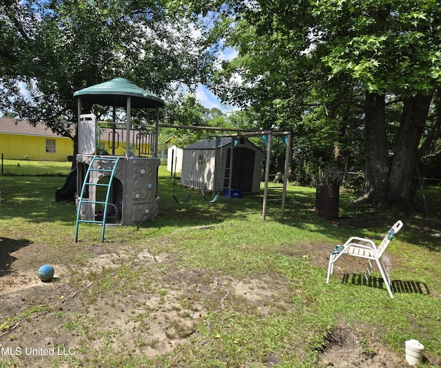2710 E Angela Cir, Gulfport, MS 39503 - view of grassy yard featuring a playground