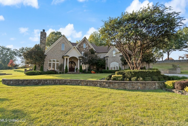 view of front of home with a front yard