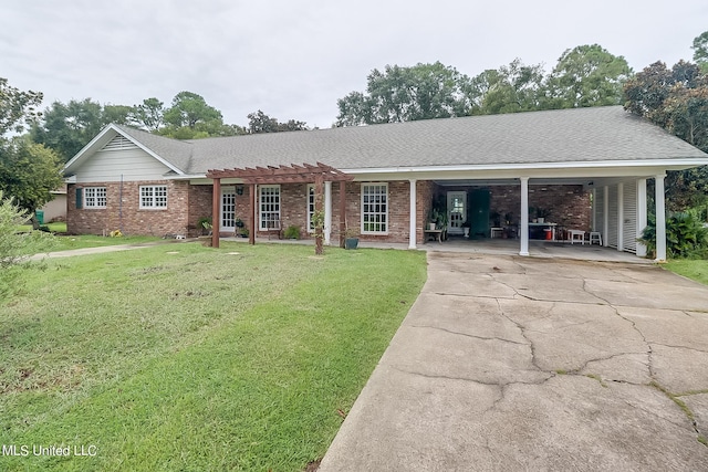 single story home with a front yard and a carport