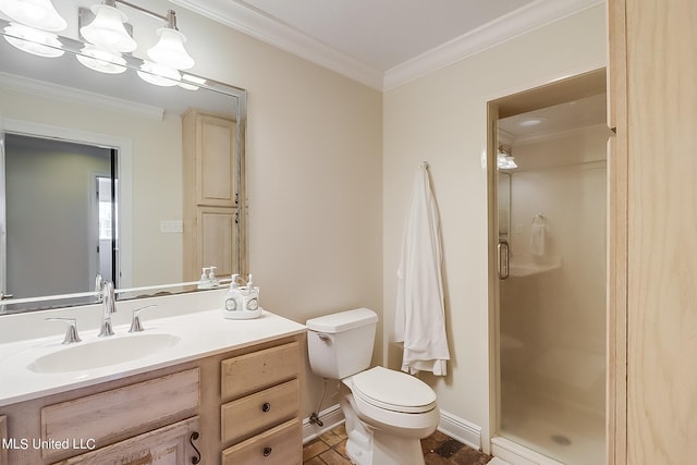 bathroom featuring vanity, crown molding, toilet, and an enclosed shower