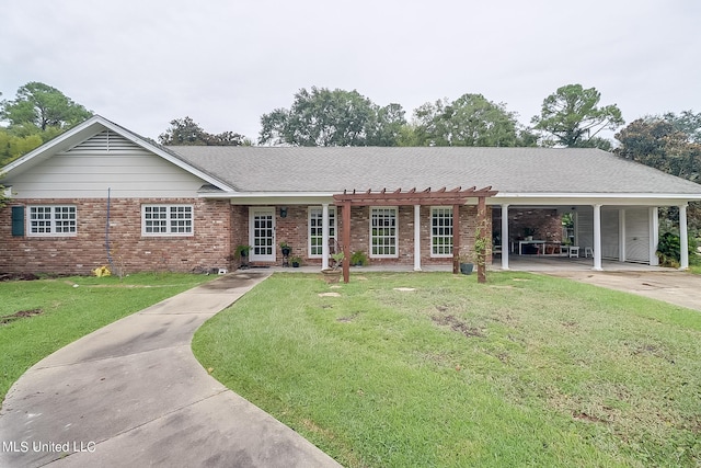 ranch-style house with a patio area and a front lawn