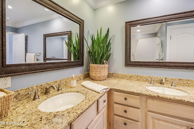 bathroom featuring vanity and ornamental molding