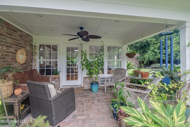 view of patio featuring ceiling fan