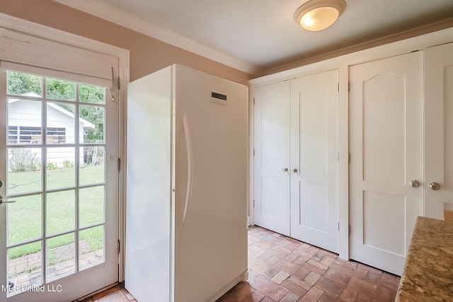1 Bayou View Dr, Gulfport, MS 39507 - entryway featuring brick patterned flooring and ornamental molding