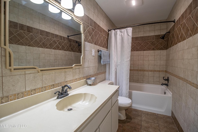 204 Trautman Ave, Long Beach, MS 39560 - full bathroom with tile walls, shower / tub combo with curtain, vanity, and tile patterned flooring