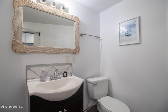 204 Trautman Ave, Long Beach, MS 39560 - half bath featuring vanity and decorative backsplash