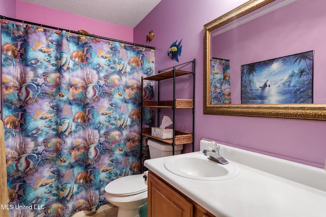 2804 Oakridge Cir, Gulfport, MS 39507 - bathroom featuring vanity, toilet, a textured ceiling, and a shower with shower curtain